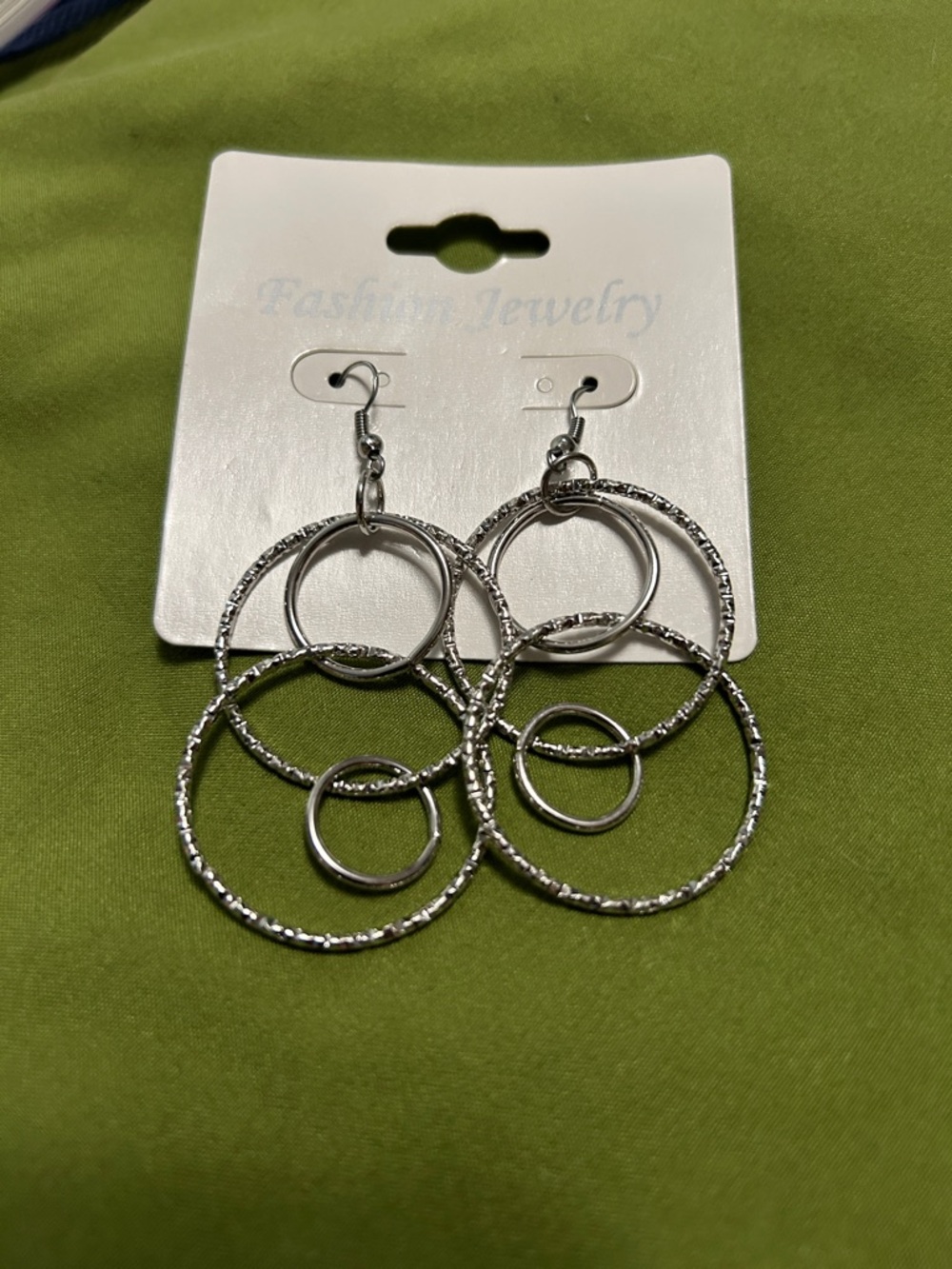 Fashion Jewelry dangle earrings Multi-Hoop design of polished and textured hoops